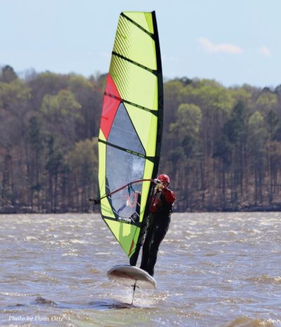 Scott windfoiling on a lake